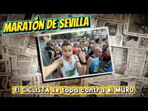 Un CICLISTA topandose con EL MURO del MARATON en Sevilla